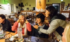 Course participants get pronunciation tips in an Agnone cafe, Italy.