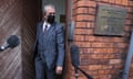Edwin Poots leaves the DUP headquarters in Belfast after saying he would stand down as the party leader following an internal party revolt against him.