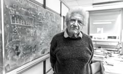 Jack Steinberger in front of blackboard