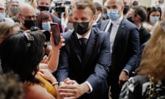Emmanuel Macron meets local people during a visit to Martel, southern France