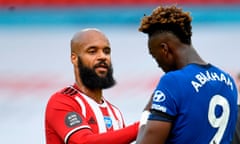 FBL-ENG-PR-SHEFFIELD UTD-CHELSEA<br>Sheffield United’s English-born Irish striker David McGoldrick (L) consoles Chelsea’s English striker Tammy Abraham (R) after the English Premier League football match between Sheffield United and Chelsea at Bramall Lane in Sheffield, northern England on July 11, 2020. - Sheffield United won the game 3-0. (Photo by PETER POWELL / POOL / AFP) / RESTRICTED TO EDITORIAL USE. No use with unauthorized audio, video, data, fixture lists, club/league logos or ‘live’ services. Online in-match use limited to 120 images. An additional 40 images may be used in extra time. No video emulation. Social media in-match use limited to 120 images. An additional 40 images may be used in extra time. No use in betting publications, games or single club/league/player publications. / (Photo by PETER POWELL/POOL/AFP via Getty Images)