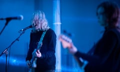 Alan Sparhawk of Low performing in Edinburgh, with Liz Draper in foreground.