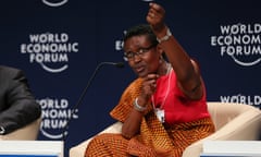 Winnie Byanyima, executive director of the charity Oxfam, speaks during the first plenary session of the World Economic Forum (WEF) in Abuja May 8, 2014. REUTERS/Afolabi Sotunde  (NIGERIA - Tags: POLITICS BUSINESS) - RTR3OADD