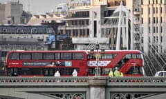 Firearms Incident Takes Place Outside Parliament<br>LONDON, ENGLAND - MARCH 22: Police and forensic officers at the scene of a terrorist attack in which a number of pedestrians were mowed down on Westminster Bridge on March 22, 2017 in London, England. Four people including a police officer and his attacker have been killed in two related incidents outside the Houses of Parliament and on Westminster Bridge in what Scotland Yard are treating as a terrorist incident. (Photo by Carl Court/Getty Images)