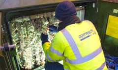 BT Openreach engineer works on upgrading a telephone exchange to superfast broadband
