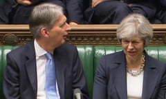 Budget 2017<br>Chancellor Philip Hammond and Prime Minister Theresa May listen to Shadow Chancellor John McDonnell speaking in the House of Commons, London, after the Chancellor told MPs that the Government will not proceed with the increase in National Insurance contributions for the self-employed set out in the Budget. PRESS ASSOCIATION Photo. Picture date: Wednesday March 15, 2017. The Chancellor said he would not proceed with the planned 2% increase in Class 4 NICs which he announced just a week ago. See PA story POLITICS Budget. Photo credit should read: PA Wire