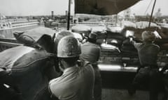 Indian soldiers take positions from a building adjoining the Golden Temple during Operation Blue Star in 1984