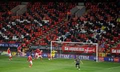 Charlton fans watch their team take on MK Dons at the Valley.