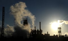 The sun sets behind the Tata steel works in Port Talbot