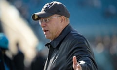 Carolina Panthers owner David Tepper watches the players warm up from the sideline before Sunday’s game against the Jacksonville Jaguars.