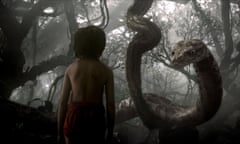 Mowgli (Neel Sethi) encounters Kaa the giant python (Scarlett Johansson) in Jon Favreau’s The Jungle Book.