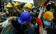 Hong Kong protesters storm the legislative council on 1 July 2019