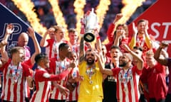 Brentford celebrate after beating Swansea in the play-off final to earn promotion