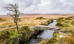 Clapper bridge over the Walla Brook on Scorhill Down, Dartmoor National Park, Devon, England, UK.<br>2BNCFT2 Clapper bridge over the Walla Brook on Scorhill Down, Dartmoor National Park, Devon, England, UK.