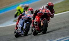 Francesco Bagnaia (right) and Marc Márquez do battle during the race.