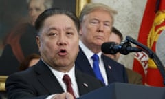 Hock Tan, Donald Trump<br>FILE - In this Thursday, Nov. 2, 2017, file photo, Broadcom CEO Hock Tan speaks while U.S. President Donald Trump listens, in background, during an event at the White House in Washington, to announce the company is moving its global headquarters to the United States. In a decision announced Monday, March 12, 2018, Trump is blocking Singapore chipmaker Broadcom from pursuing a hostile takeover of U.S. rival Qualcomm on the grounds that the combination would threaten national security. (AP Photo/Evan Vucci, File)