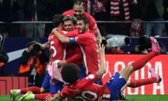 Atlético Madrid’s Antoine Griezmann celebrates scoring against Real Madrid