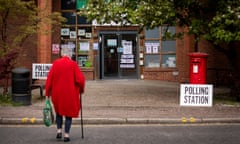 Voter in front of Chipping Barnet polling station