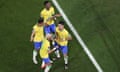 Brazil's Vinicius Junior, Danilo and Neymar dance with Lucas Paqueta, right, after he scored his side's fourth goal during the World Cup round of 16 soccer match between Brazil and South Korea, at the Education City Stadium in Al Rayyan, Qatar, Monday, Dec. 5, 2022. (AP Photo/Pavel Golovkin)