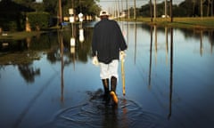 Floods Hinder Recovery Efforts In Southeast Texas<br>ORANGE, TX - SEPTEMBER 07: Paul Morris checks on neighbors homes in a flooded district of Orange as Texas slowly moves toward recovery from the devastation of Hurricane Harvey on September 7, 2017 in Orange, Texas. Almost a week after Hurricane Harvey ravaged parts of the state, some neighborhoods still remained flooded and without electricity. While downtown Houston is returning to business, thousands continue to live in shelters, hotels and other accommodations as they contemplate their future. (Photo by Spencer Platt/Getty Images)