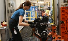 The New State Of The Art Ford Production Line<br>DAGENHAM, ENGLAND - JANUARY 13: An employee works on an engine production line at a Ford factory on January 13, 2015 in Dagenham, England. Originally opened in 1931, the Ford factory has unveiled a state of the art GBP475 million production line that will start manufacturing the new low-emission, Ford diesel engines from this November this will generate more than 300 new jobs, Ford currently employs around 3000 at the plant in Dagenham. (Photo by Carl Court/Getty Images)