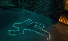 Chalk outline of body of victim on pavement