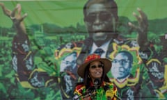 Former first lady of Zimbabwe Grace Ntombizodwa Mugabe in front of a poster of her husband.