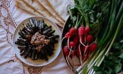 Warak enab served with radishes, spring onion, Lebanese bread and mint.