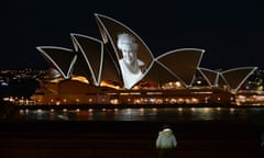 The Sydney Opera House sails lit up with a portrait of Queen Elizebeth II