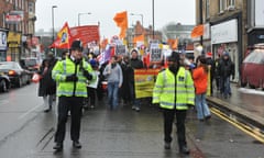 Police escort protesters