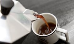 coffee being poured from a stovetop espresso coffee maker