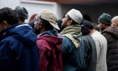 People pray at a mosque