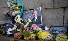 Floral tributes to Sir David Amess outside parliament