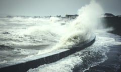 Waves splashing on shore during storm