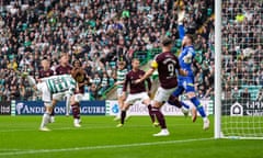 Kyogo Furuhashi heads the ball past Zander Clark of Hearts for 1-0.