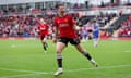 Lucia Garcia of Manchester United celebrates scoring her team's first goal.