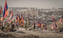 The flags of Armenia and the non-recognised Nagorno-Karabakh Republic (Artsakh) at the cemetery in Erevan, Armenia.