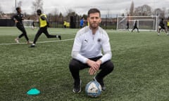 Manager Luke Garrard with Boreham Wood youth team players in training.