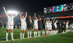 The Philippines players stand in a line and raise their hands to thank the crowd after losing to Norway and being knocked out of the Women's World Cup