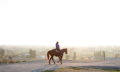 A horse rider desends into the haze in Porterville California on 19th December 2016. Porterville is one of the most poluted cities in the US. Pic to accompany Chris McGreal article. FAO Sarah Gilbert.
pic © Dan Tuffs 2016
001 310 774 1780
dan@dantuffs.com
www.dantuffs.com