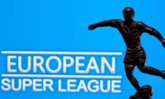 A metal figure of a football player with a ball is seen in front of the words European Super League