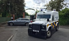 Police and army bomb disposal experts at Shandon Park golf club in Belfast, where the device was found.