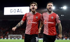 Adam Armstrong (right) celebrates with teammate Ryan Manning after firing Southampton 2-0 in front.