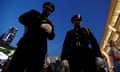 Dallas police officers take part in a candlelight vigil at Dallas City Hall following the multiple police shootings in Dallas, Texas, U.S., July 11, 2016. REUTERS/Carlo Allegri