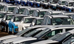 Thousands of new cars lined up at a compound