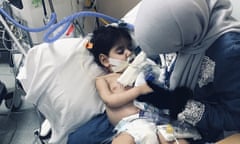 In this Wednesday, Dec. 19, 2018, photo released by the Council on American-Islamic Relations, Sacramento Valley, Shaima Swileh holds her dying 2-year-old son Abdullah at a hospital in Oakland, Calif. Swileh, a Yemeni mother who fought for the right to see her dying son, arrived Wednesday night after the Trump administration gave her a long-sought waiver to its travel ban. (Council on American-Islamic Relations, Sacramento Valley via AP)