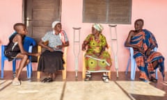 76-year-old Ekua Ketsewa chats with family members