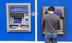 A man getting cash from a Halifax bank ATM cash machine, Norwich UK<br>DH09BT A man getting cash from a Halifax bank ATM cash machine, Norwich UK