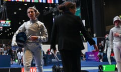 FENCING-ITA-WC-SABRE-WOMEN<br>Ukraine's Olga Kharlan (L) leaves the fencing strip after she refused to shake hands with Russia's Anna Smirnova (R), registered as an Individual Neutral Athlete (AIN), after Kharlan defeated Smirnova during the Sabre Women's Senior Individual qualifiers, as part of the FIE Fencing World Championships at the Fair Allianz MI.CO (Milano Convegni) in Milan, on July 27, 2023. (Photo by Andreas SOLARO / AFP) (Photo by ANDREAS SOLARO/AFP via Getty Images)