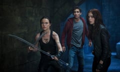 Jemima West Robert Sheehan Lily Collins<br>In this publicity photo released by Sony Pictures Entertainment, Inc., from left, Jemima West as Isabelle Lightwood,  Robert Sheehan as Simon and Lily Collins as Clary, prepare to hold off the demons in a scene from Screen Gems' "The Mortal Instruments: City of Bones." The film releases in theaters August 21, 2013. (AP Photo/Sony Pictures Entertainment, Inc., Rafy)